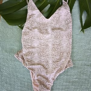 Girl and the water one piece